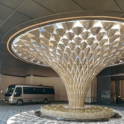 Shaped aluminum veneer column cladding for hotel atriums – perforated/carved options, fully customizable colors.