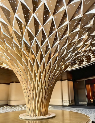 Shaped aluminum veneer column cladding for hotel atriums – perforated/carved options, fully customizable colors.