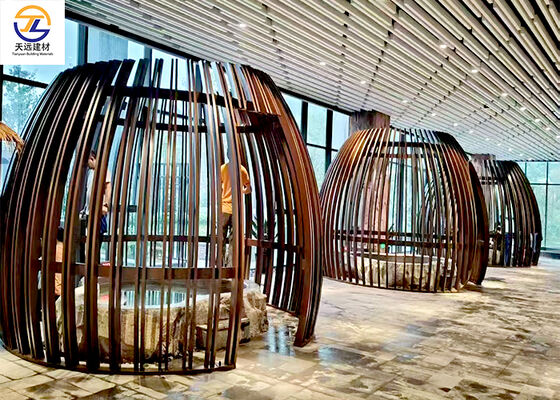 Curved Aluminum Battens with Birdcage Pattern Wood Grain Finish – Special-Shaped Flower-Designed Bent Aluminum Square Tubes for Commercial Mall & Hotel Curtain Walls & Feature Walls