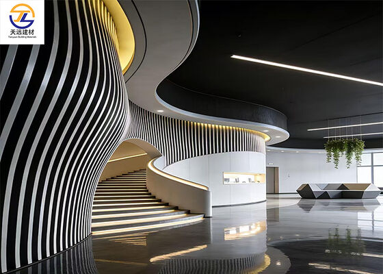 urved Aluminum Baffle Wall Cladding | Futuristic Wave Design for Premium Lounge & Lobby