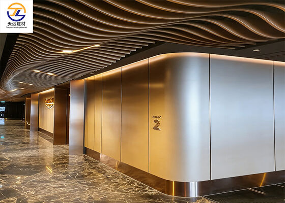 Curved Aluminum Baffle Ceiling | Dynamic Wave Design for Luxury Elevator Lobbies
